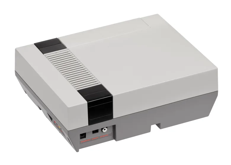 A Nintendo Entertainment System console, rear three-quarter view